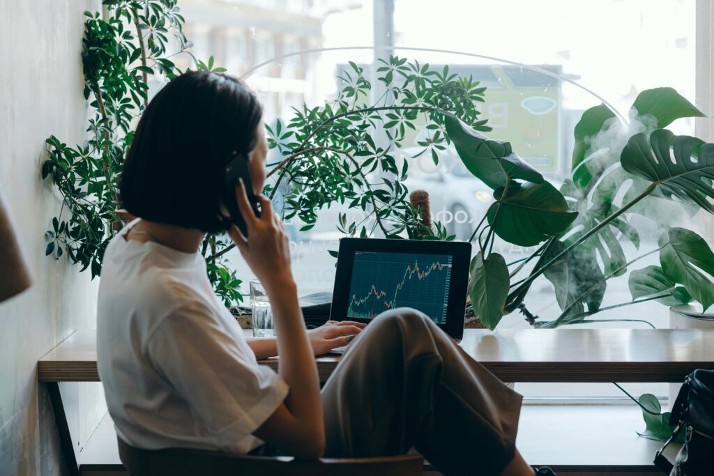 pexels-photo-7681681 Businesswoman in White Shirt Sitting on Chair while Having Phone Call